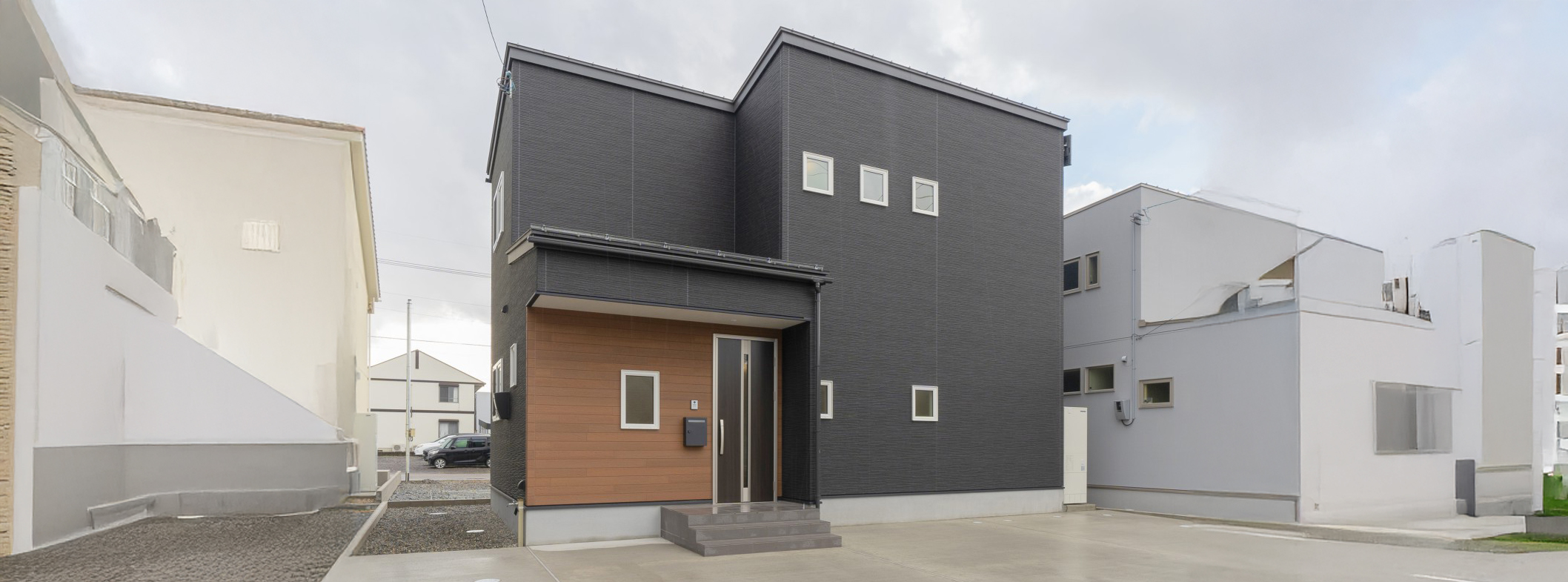 ナチュラルな木調とグレーが可愛い、優しい風合いのお家