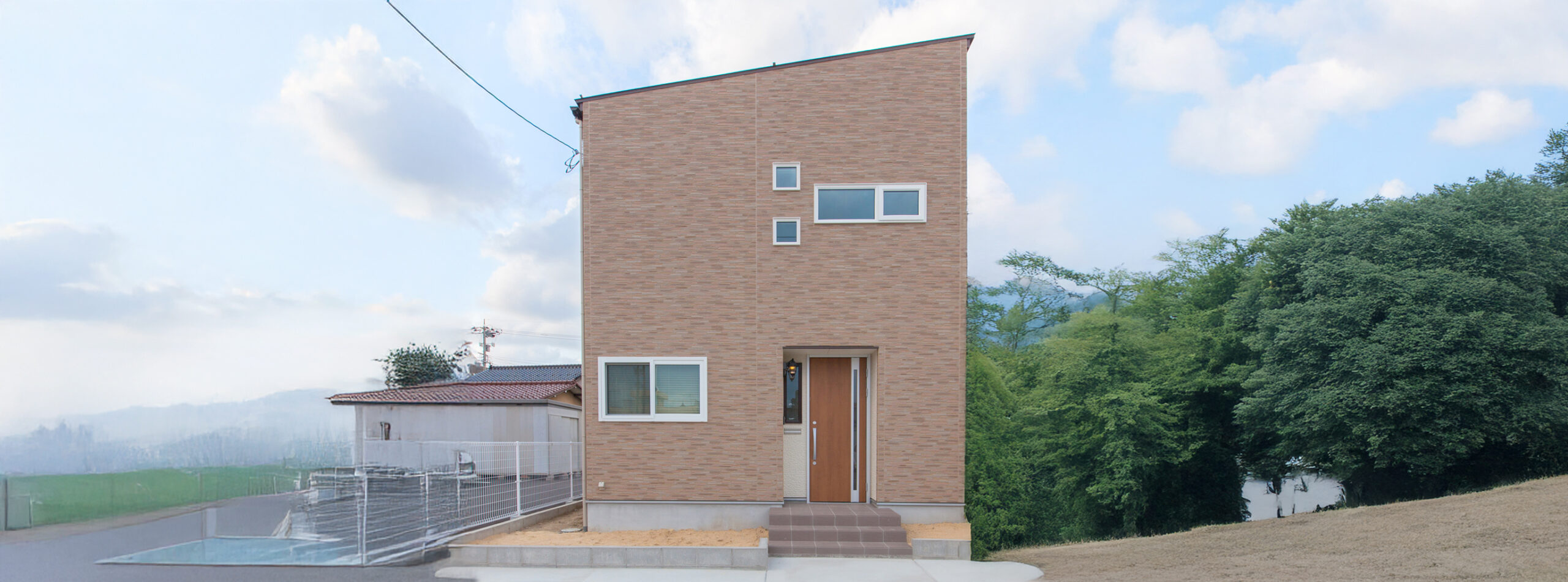 長く安心して住まえる　オープン階段と無垢床リビングの家